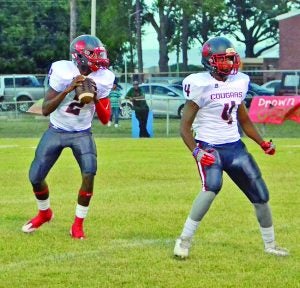 Behind the arm and legs of sophomore quarterback Kenneth “K. J”. Jefferson (back) and running back Jamal Leverson, the North Panola Cougars have logged a 5-0 record midway through the 2016 season. Friday, the Cougars took down O’Bannon on the road 36-27. This upcoming Friday, the Cougars will be back on the road to take on Manassas in Memphis. The Panolian photo by Ike House