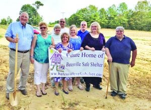 Supporters and board members recently on hand for the groundbreaking ceremony at the proposed site of a women’s shelter are (from left) Andy Hosler, Lisa Webster, Shirley Tramel, Damon Plummer, Becky Pinkard, Diane Lietzau Nadolni, Chaplain Jake Julian, Donnis Davis and Fred Davis. Upcoming fundraisers and additional pastoral support have created additional interest in the building and operation of a local Safe Shelter for abused women and children. Photo furnished