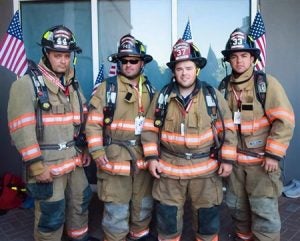 Four Batesville firefighters (from left) Mark Story, James Bryant, Timothy Hill, Bradley Striplin climbed 110 floors in Panama City, Florida Sunday in remembrance of not only the 343 firefighters who perished on 9/11/2001, but also in memory of Eric Gustafson, of Meridian Fire Department. The local group joined others at the Panama City location while thousands of other first responders across the country took time and made the effort to memorialize those who sacrificed their lives 15 years ago. Photo provided 