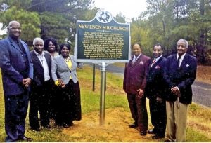 Shown with the new historical marker are (l. to r.) Willie Vaughn, James Vaxter, Ethyl Austin, Ruth Vaughn, Pastor Robert Earl Vaughn Sr., Randy Austin and Elmer Fox. Photos provided 