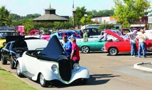 Andy and Riley Young were among the car enthusiasts who enjoyed a picture-perfect fall day spectating at Saturday’s Showoff on the Square sponsored by the City of Batesville and the Mississippi Delta Street Rods.  The Panolian photo by Glennie Pou