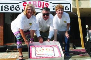 Happy Birthday Sardis was the theme to last weekends sesquicentennial celebration sponsored by the City of Sardis, and Sardis Chamber of Commerce. A culmination of two weeks of activities, participant enjoyed food, music, arts, crafts, a proclamation and cake. Showing off the birthday cake are Susan Mills, Mayor Billy Russell and Chamber Ex. Sec. Debbie Fletcher. The Panolian photo by Gleenie Pou