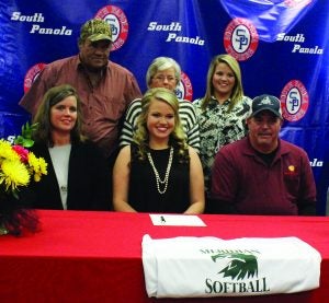 South Panola third baseman Morgan Parker (front, center) signed a national letter of intent to play softball at Meridian Community College. On hand to witness the signing Tuesday were family members (front, l. to r.) mother Rachel Gregg, Morgan, father Scott Parker; (back) grandparents Bobby and Joyce Moore and sister Laura Beth Parker. The Panolian photo by Myra Bean