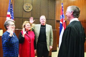 Judge Smith Murphey on December 29 administered the oath of office to Panola County Election Commissioners (from left) Kaye Smythe, Wanda Carmichael and Wayne Belk. The Panolian photo by Rupert Howell