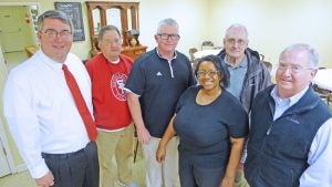 Coach Ricky Woods drew a crowd at the Batesville Exchange Club Wednesday. From left are South Panola Schools Superintendent Tim Wilder, new SP defensive coordinator Chuck Friend, Ricky Woods, Myra Bean, Willis Wright, George C. Carlson. The Panolian photo by John Howell