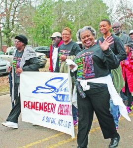 Representing Shiloh M.B. Church in the MLK Day march Monday in Batesville were (from left) Julie Williams, Kiylan Williams, Minnie Harrison, Daisy Herring and Cynthia Harrison. More than 300 participated, proceeding from Mt. Zion Church on Panola Avenue to Batesville Intermediate School, where King’s life and legacy were celebrated in a commemorative program. The Panolian photo by Glennie Pou
